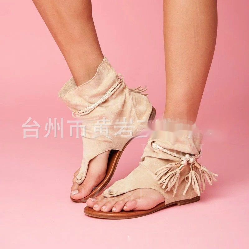 Plus size women's retro flat bottom sandals with a tassel clip toe, offering a stylish and comfortable design for casual wear.