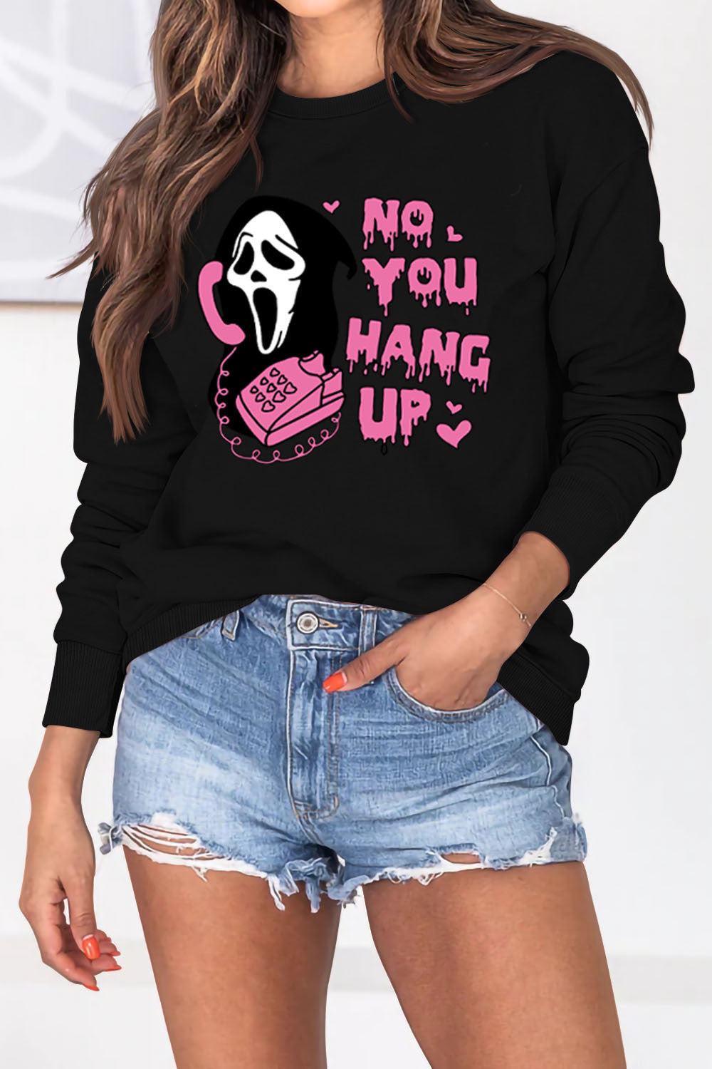 Women's Halloween-themed pullover sweater for fall and winter, featuring a cozy and trendy design perfect for seasonal style.