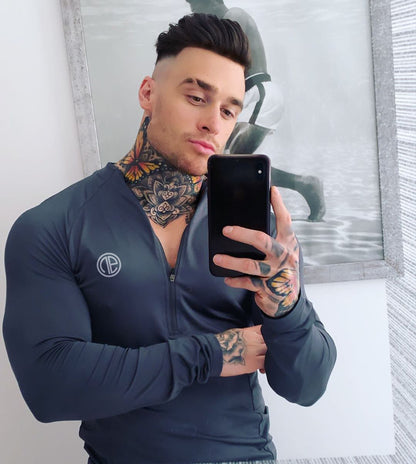 Men's black long sleeve zipper neck fitness shirt for gym workouts