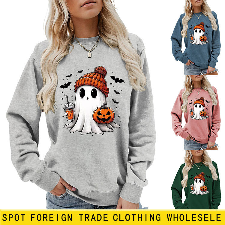 Fashionable long sleeve crew neck sweatshirt in milk tea color with pumpkin and bat print, perfect for fall and Halloween.