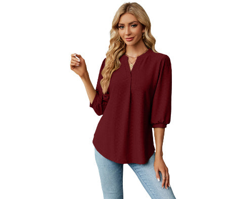 Women's solid color long sleeve top with lace collar and jacquard pattern. Loose-fitting T-shirt for a comfortable and stylish casual look.