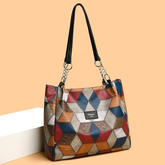 Retro geometric pattern color-matching shoulder bag with large capacity, stylish stitching design for women. Fashionable tote handbag in vibrant colors, perfect for everyday use.