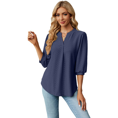 Women's solid color long sleeve top with lace collar and jacquard pattern. Loose-fitting T-shirt for a comfortable and stylish casual look.