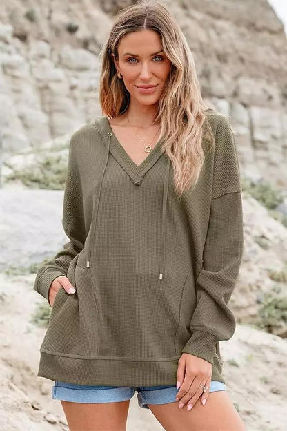 "Women's V-neck Waffle Hoodie in Solid Color - Long-sleeved, stylish, and comfortable sweatshirt ideal for layering and casual wear."