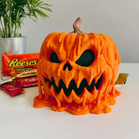 
"Melting Halloween Pumpkin Candy Bowl with eerie dripping design, perfect for trick-or-treat candy display, Halloween decor, spooky pumpkin bowl."