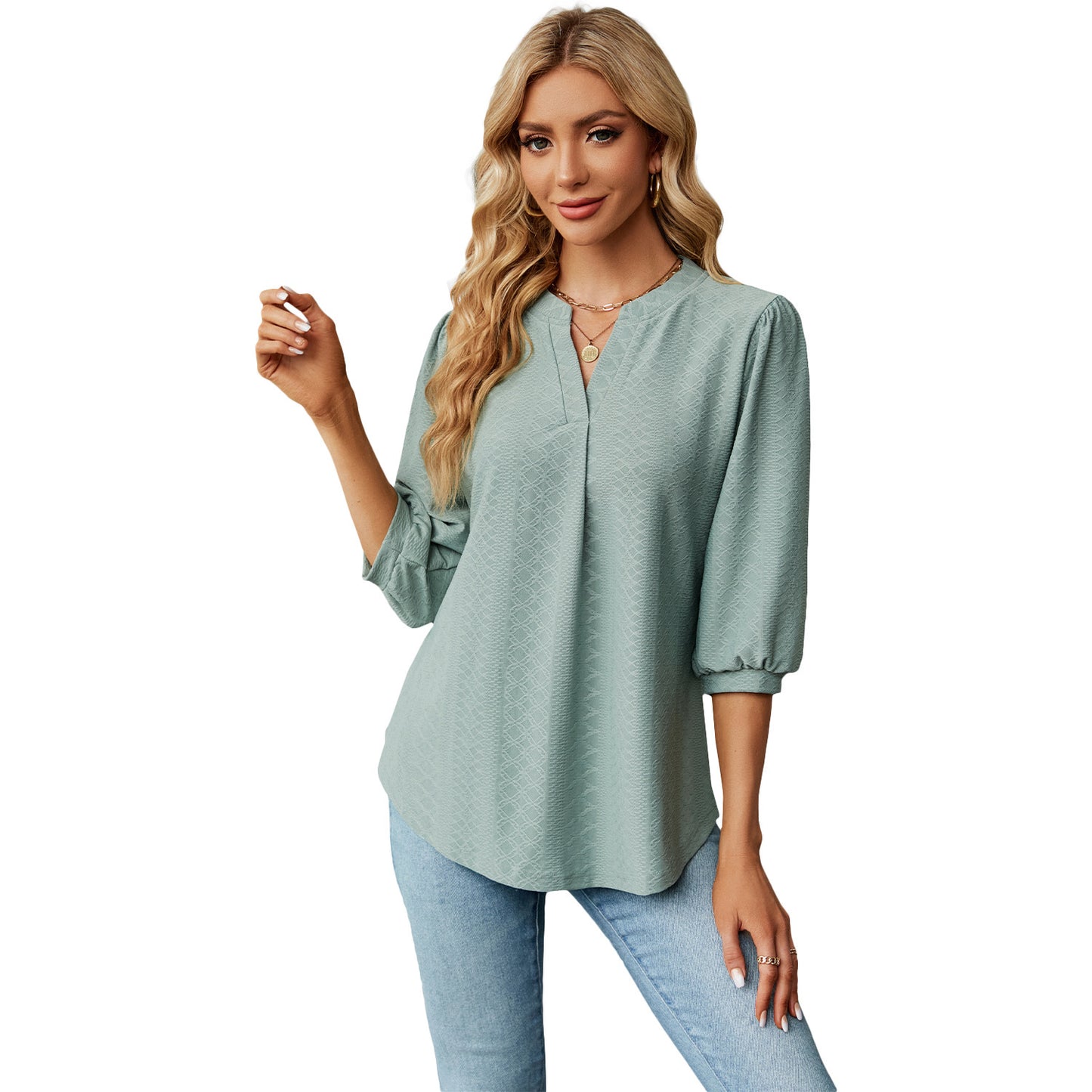 Women's solid color long sleeve top with lace collar and jacquard pattern. Loose-fitting T-shirt for a comfortable and stylish casual look.