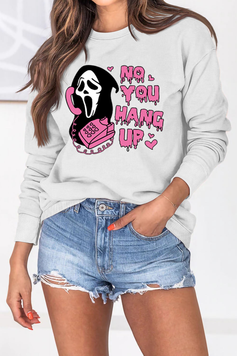 Women's Halloween-themed pullover sweater for fall and winter, featuring a cozy and trendy design perfect for seasonal style.