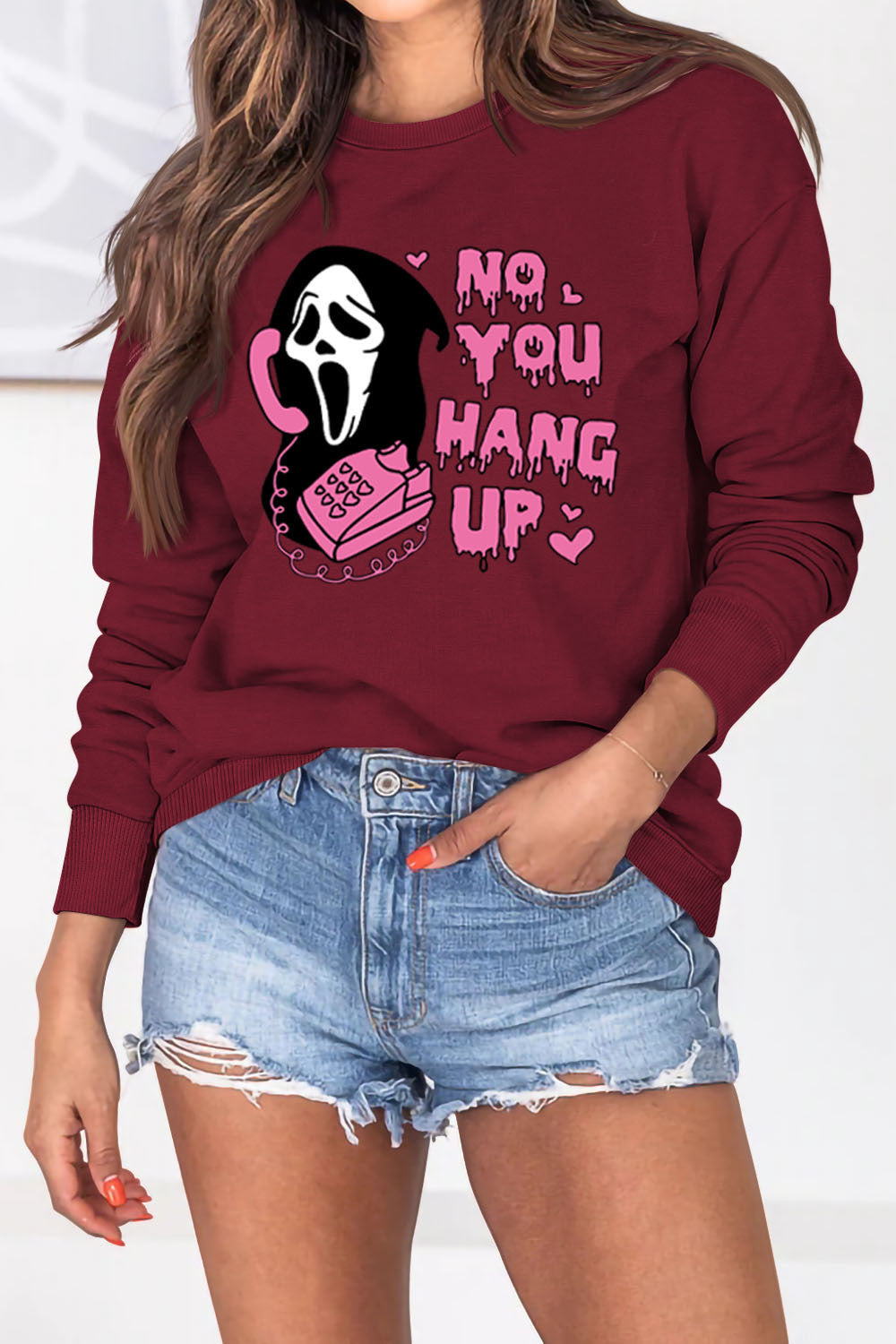 Women's Halloween-themed pullover sweater for fall and winter, featuring a cozy and trendy design perfect for seasonal style.