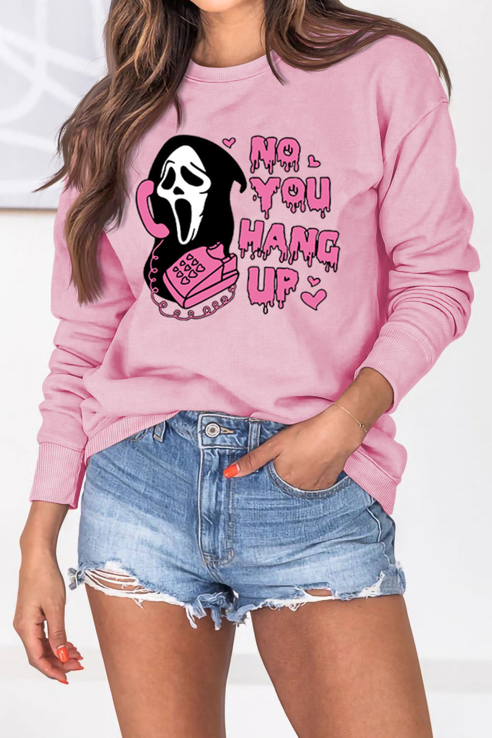 Women's Halloween-themed pullover sweater for fall and winter, featuring a cozy and trendy design perfect for seasonal style.