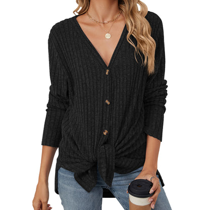 Women's solid color knitted cardigan with long sleeves and button closure. Emerized coat for a cozy and stylish look."