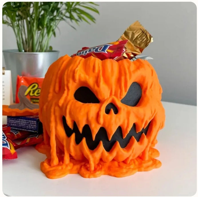 
"Melting Halloween Pumpkin Candy Bowl with eerie dripping design, perfect for trick-or-treat candy display, Halloween decor, spooky pumpkin bowl."