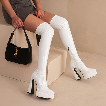 Bright faced thick heeled patent leather knee boots for women, featuring a stylish and trendy design perfect for making a bold fashion statement.