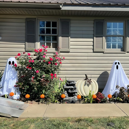 "Ghost Halloween decorations for front porch and courtyard, spooky outdoor decor, haunting ghost figures, Halloween yard decorations, eerie Halloween setup."