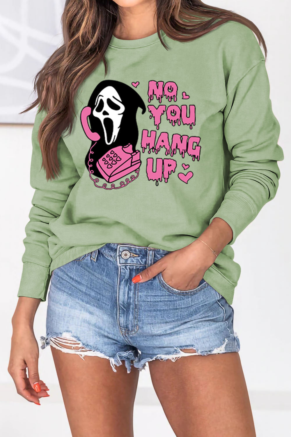 Women's Halloween-themed pullover sweater for fall and winter, featuring a cozy and trendy design perfect for seasonal style.