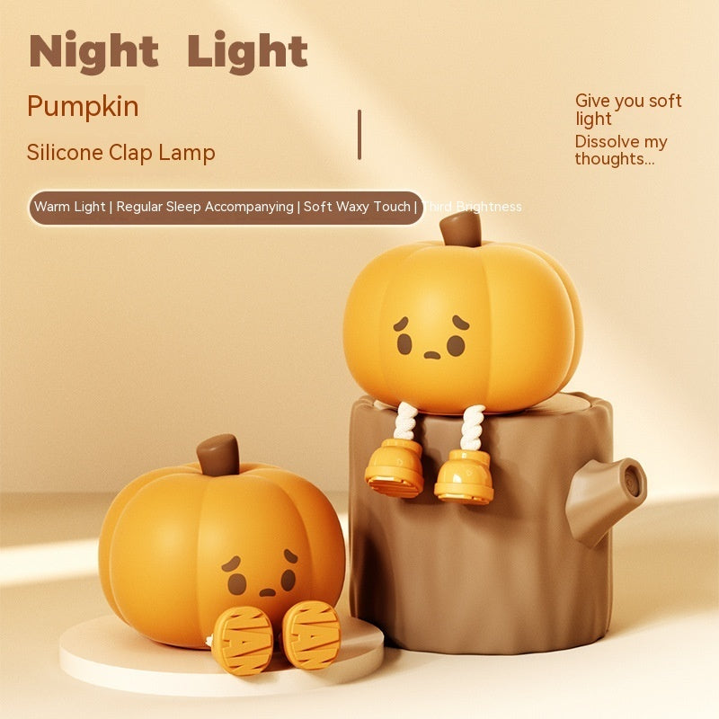 "Soft silicone Halloween pumpkin night light, perfect for kids' room decor, dimmable and rechargeable."