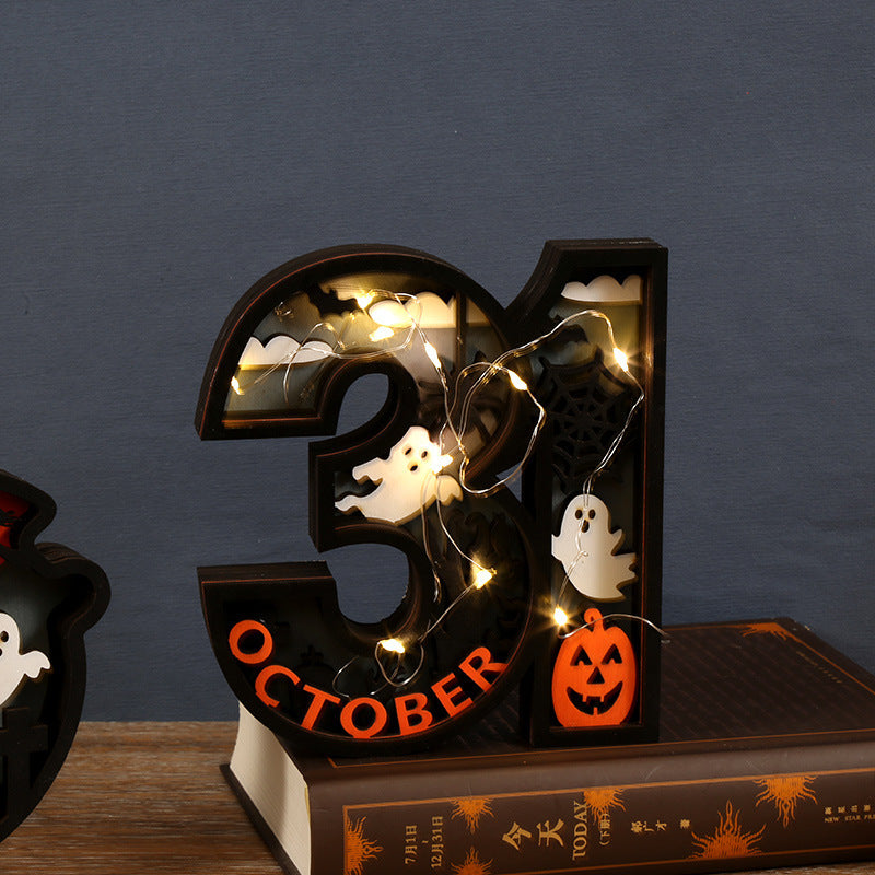 Wooden Halloween ghost decoration with glowing LED lights, perfect for spooky home decor and festive ambiance