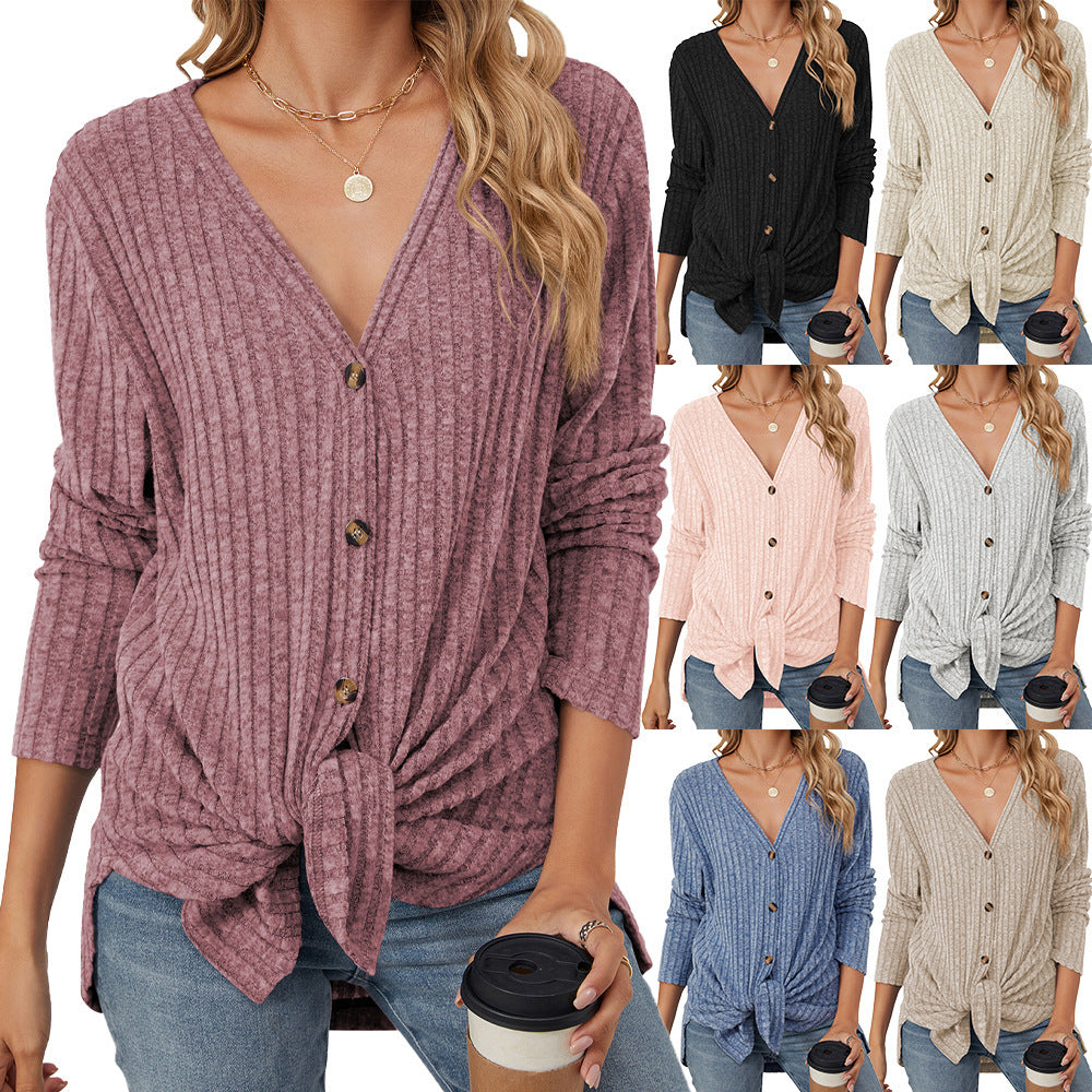 Women's solid color knitted cardigan with long sleeves and button closure. Emerized coat for a cozy and stylish look."