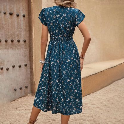 "Elegant floral dress for women in chic temperament style, perfect for summer occasions, featuring a flowy design with vibrant floral patterns."