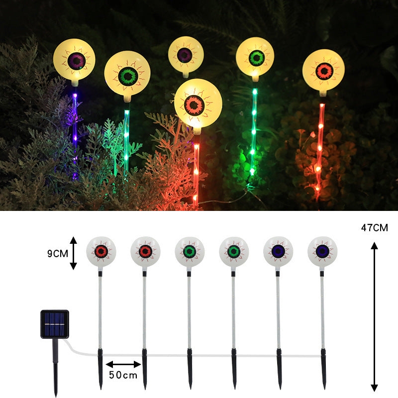 "Spooky LED Solar Halloween Eyeball Ground Lamp for outdoor courtyard decoration – energy-efficient, solar-powered lighting for Halloween yard decor in the US."