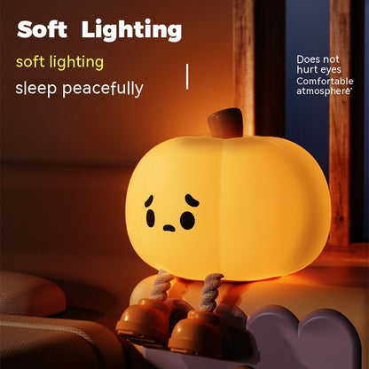 "Soft silicone Halloween pumpkin night light, perfect for kids' room decor, dimmable and rechargeable."