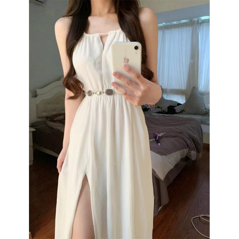 sleeveless halter dress featuring a seaside vacation style with a fitted waist-tight skirt. Ideal summer outfit for a relaxed and stylish look."






