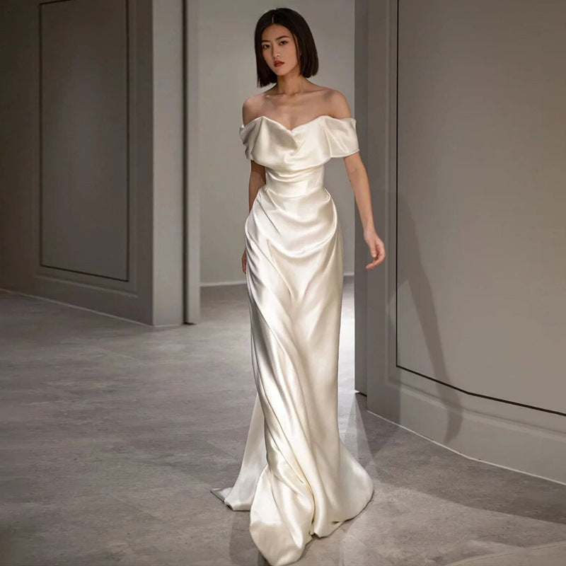 French White Off-Shoulder Sleeveless Wedding Dress, featuring a light and elegant design ideal for a chic bridal look."