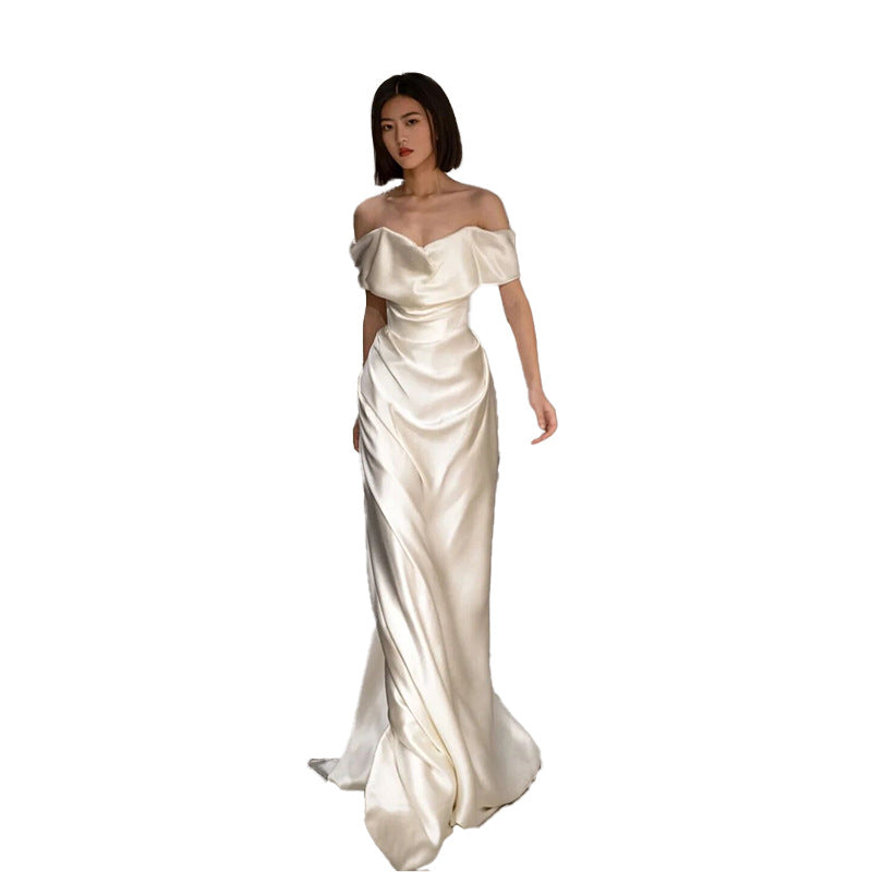 French White Off-Shoulder Sleeveless Wedding Dress, featuring a light and elegant design ideal for a chic bridal look."