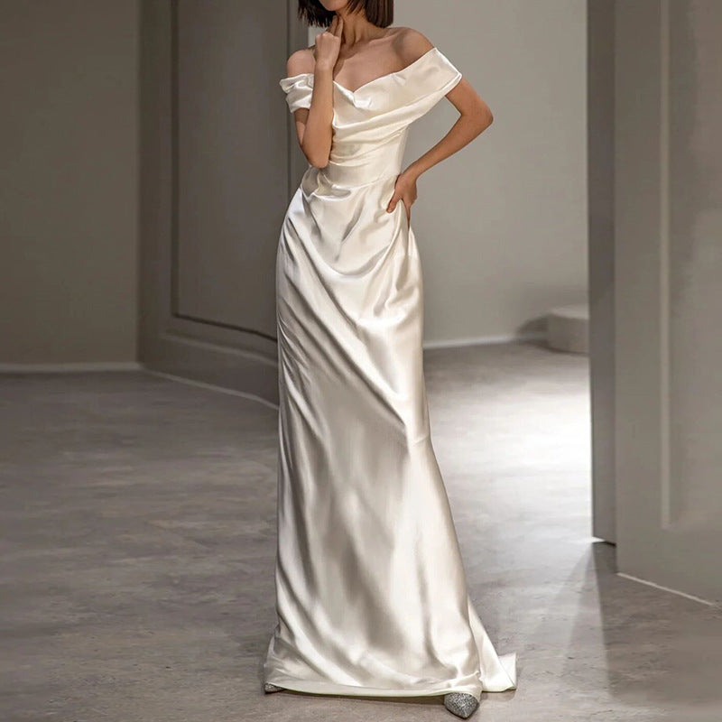 French White Off-Shoulder Sleeveless Wedding Dress, featuring a light and elegant design ideal for a chic bridal look."