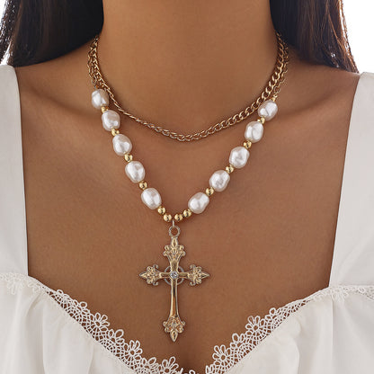 Chic pearl necklace featuring a cross pendant