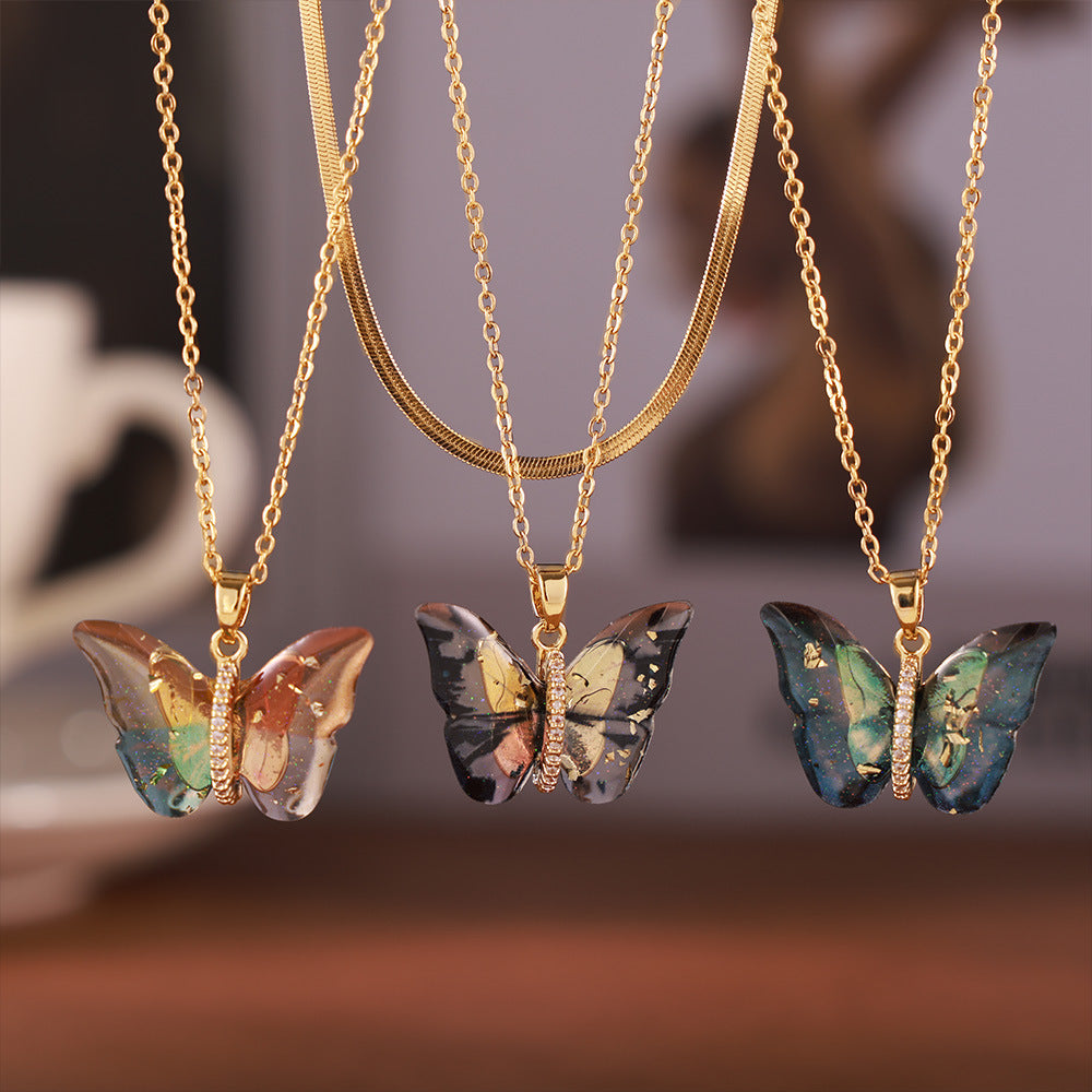 Unique resin butterfly pendant on copper chain"