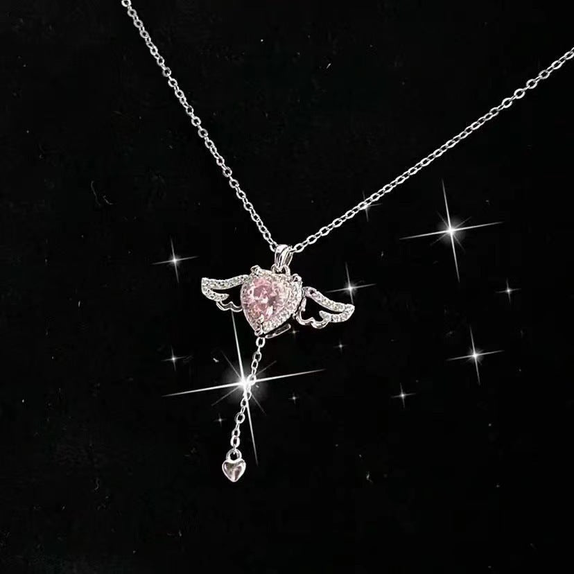 Valentine's Day gift - moving Cupid heart necklace with angel wings and crystal