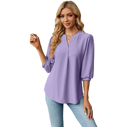 Women's solid color long sleeve top with lace collar and jacquard pattern. Loose-fitting T-shirt for a comfortable and stylish casual look.