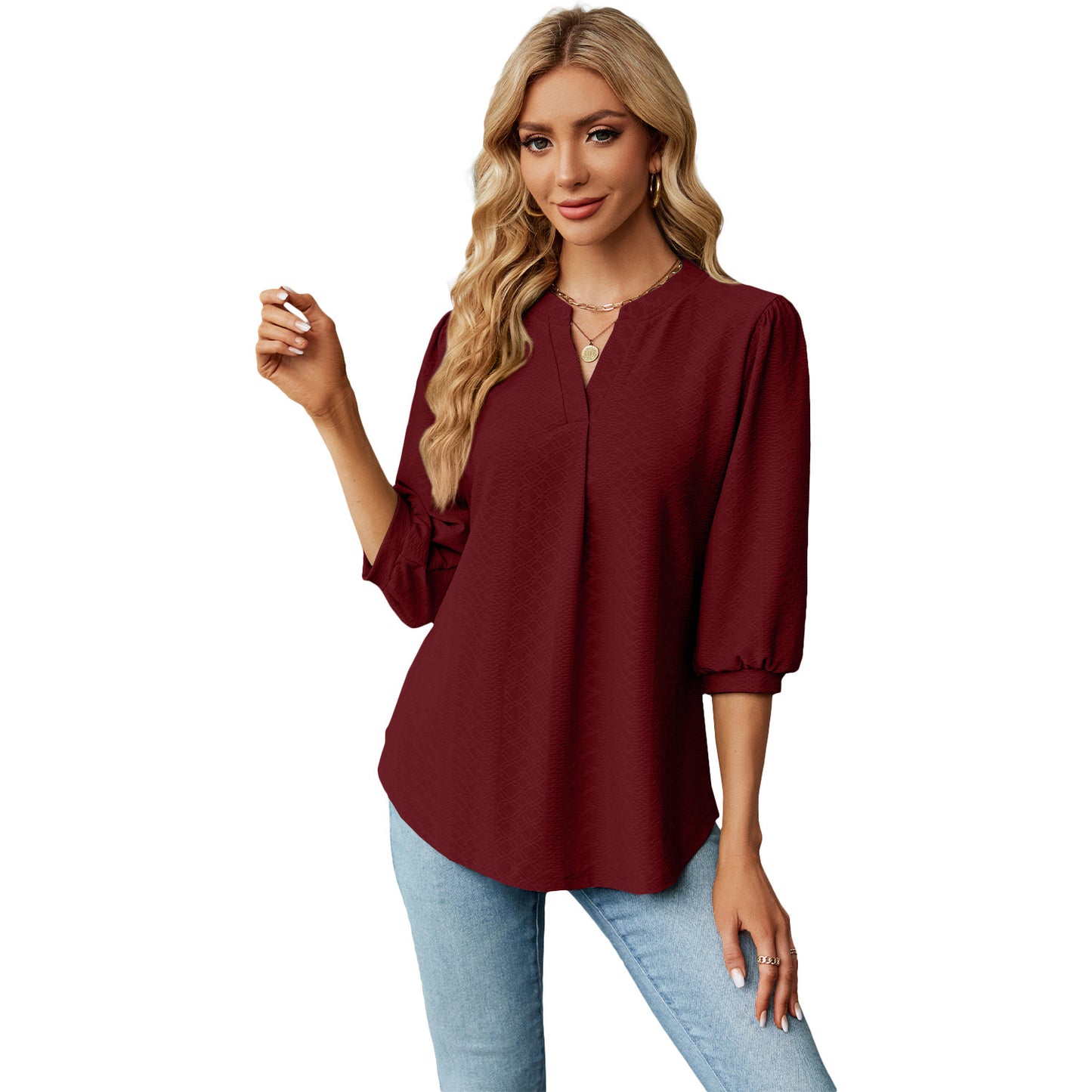 Women's solid color long sleeve top with lace collar and jacquard pattern. Loose-fitting T-shirt for a comfortable and stylish casual look.