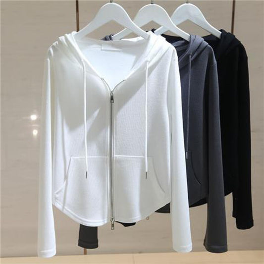 "Women's white hooded long sleeve zipper sweater, short stylish hoodie with cozy design, perfect for fall fashion."