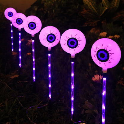 "Spooky LED Solar Halloween Eyeball Ground Lamp for outdoor courtyard decoration – energy-efficient, solar-powered lighting for Halloween yard decor in the US."