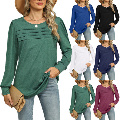 Women's solid color U-neck long-sleeve T-shirt with pleated design. Casual and stylish top for everyday wear.