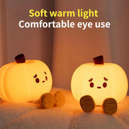 "Soft silicone Halloween pumpkin night light, perfect for kids' room decor, dimmable and rechargeable."