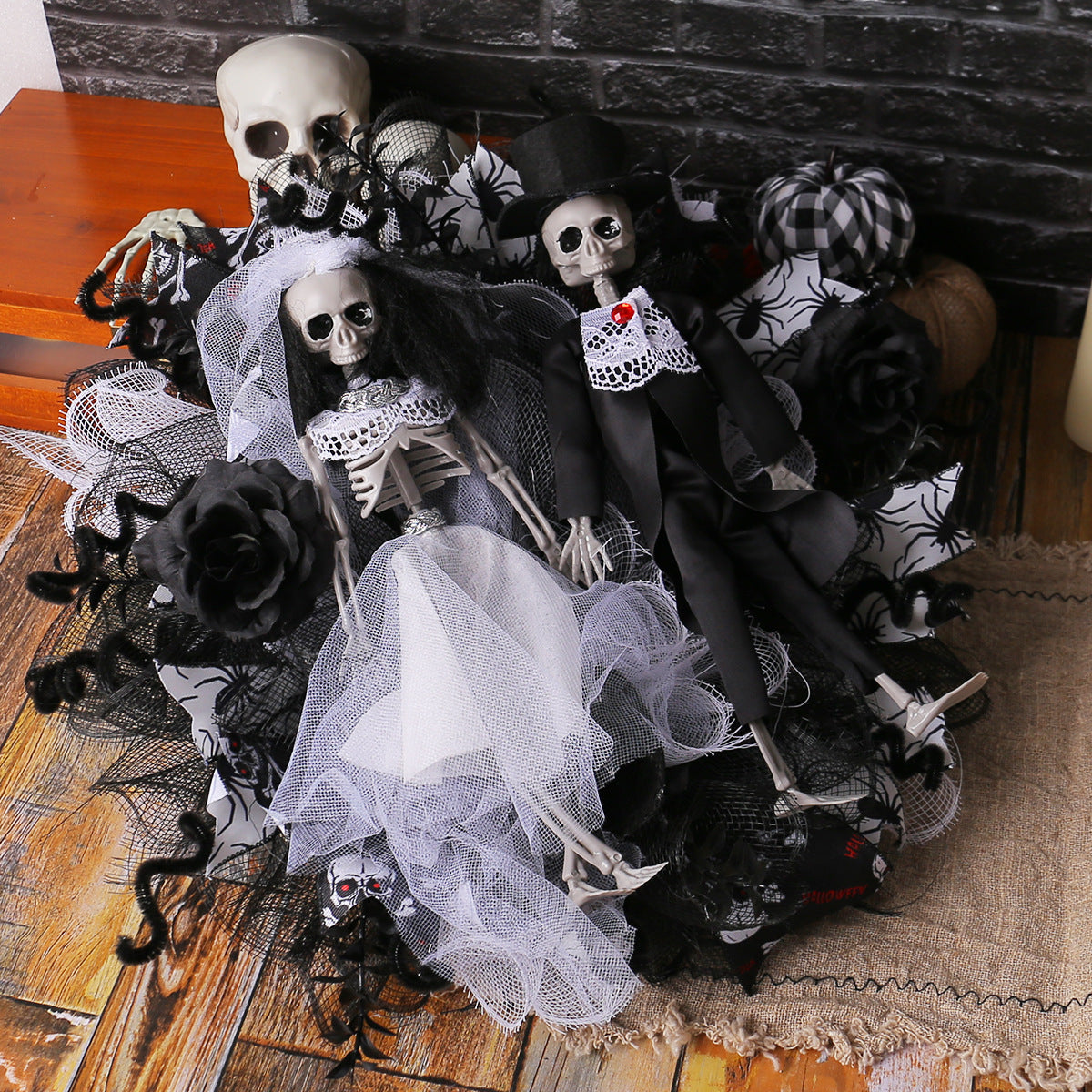 Halloween Skull Bride and Groom Mesh Garland featuring horror-themed decorations. Perfect for adding a chilling touch to your Halloween decor.