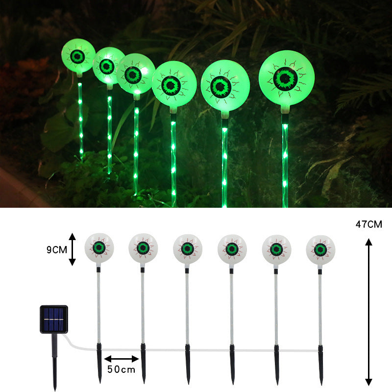 "Spooky LED Solar Halloween Eyeball Ground Lamp for outdoor courtyard decoration – energy-efficient, solar-powered lighting for Halloween yard decor in the US."