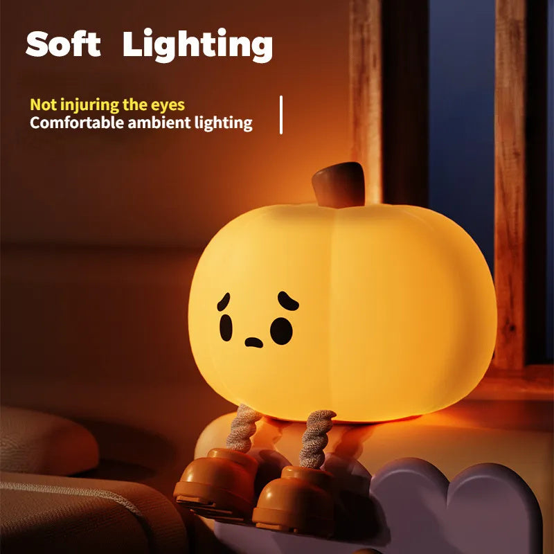 "Soft silicone Halloween pumpkin night light, perfect for kids' room decor, dimmable and rechargeable."