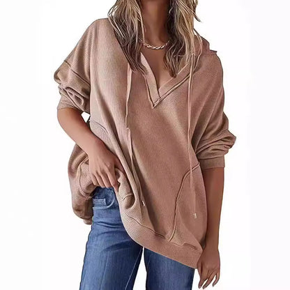 "Women's V-neck Waffle Hoodie in Solid Color - Long-sleeved, stylish, and comfortable sweatshirt ideal for layering and casual wear."