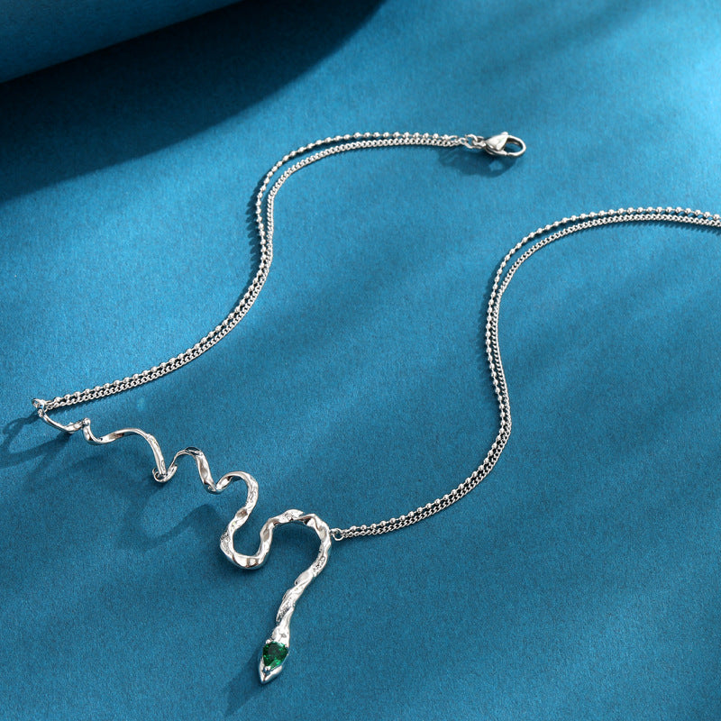 Women's Magic Snake Necklace with green zircon stone, serpent design pendant.