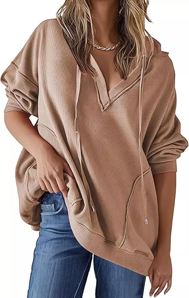 "Women's V-neck Waffle Hoodie in Solid Color - Long-sleeved, stylish, and comfortable sweatshirt ideal for layering and casual wear."