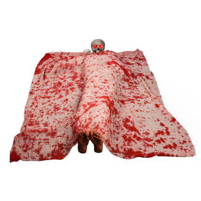 Voice-activated Halloween corpse prop with glowing hair and blood cloth for spooky decoration